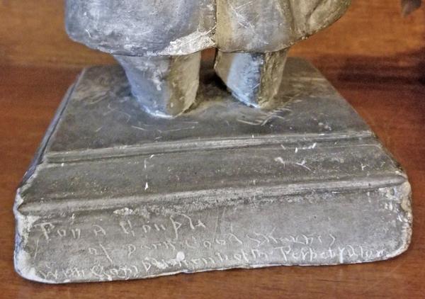 Plaster statue of Benjamin Harrison. Caricature of Benjamin Harrison made by Frank Allen Jr. circa 1895 - 1900. White plaster with a light gray paint coating. On back of base 